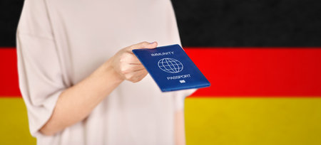 close up of woman holding immunity passportの写真素材