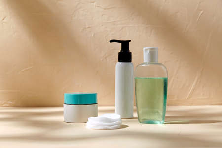 body milk, lotion, moisurizer and cotton padsの写真素材