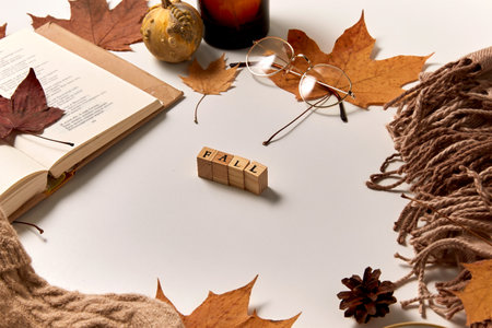 fall word made of toy blocks and autumn staffの写真素材