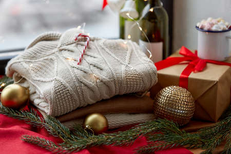 close up of sweater, candy cane, christmas garlandの写真素材