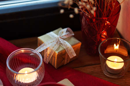 christmas gift on window sill at homeの写真素材