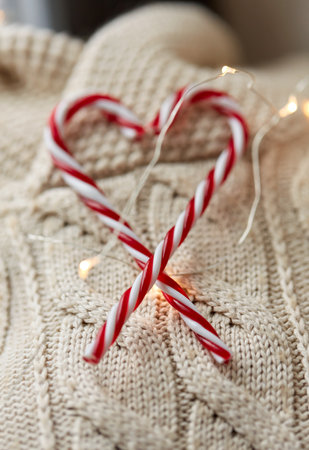 close up of sweater, candy cane, christmas garlandの写真素材