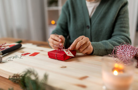 woman making advent calendar on christmas at homeの写真素材
