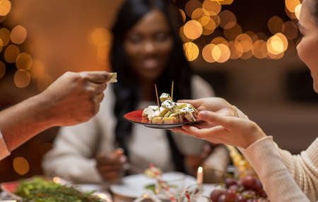 close up of people share food at christmas dinnerの写真素材