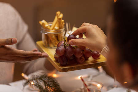 close up of people share food at christmas dinnerの写真素材