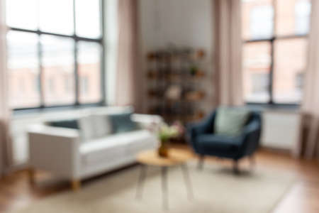 blurred living room interior at homeの写真素材