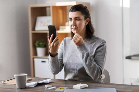 woman making self test at home