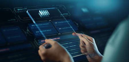 hands with transparent tablet pc and hologramの写真素材