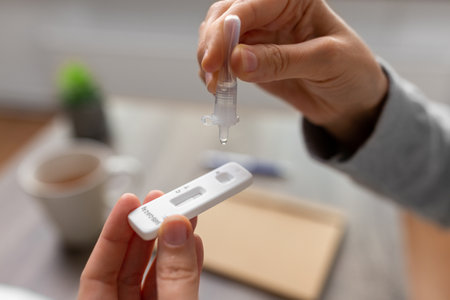 woman making self testing test at home