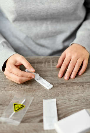woman making self testing test at home