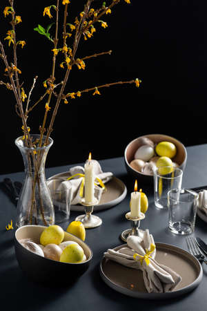close up of easter table serving over black