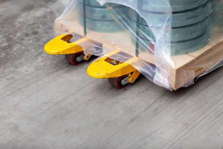 loader with cargo on pallet at warehouseの写真素材