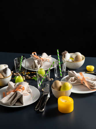 close up of easter table serving over black