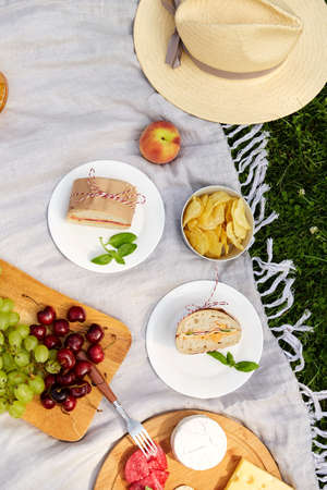 close up of food or snacks on picnic at gardenの写真素材