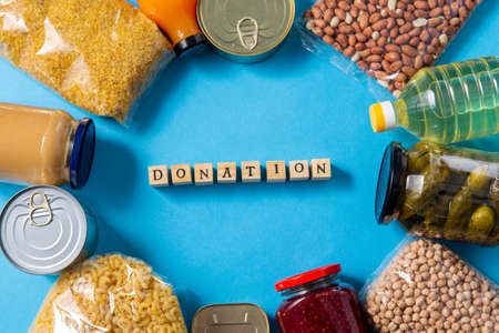 food and donation word made of wooden toy blocksの写真素材