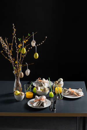 close up of easter table serving over black