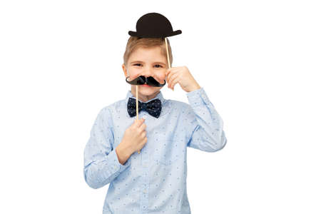 little boy with birthday party props and moustacheの写真素材