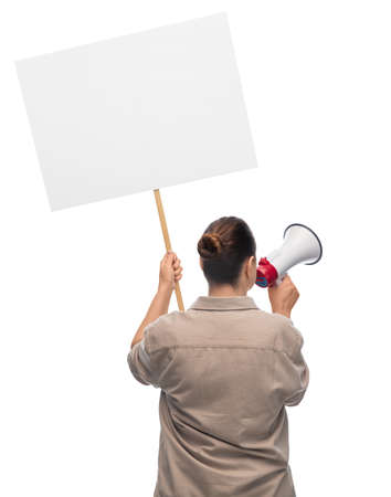 woman with megaphone protesting on demonstrationの写真素材