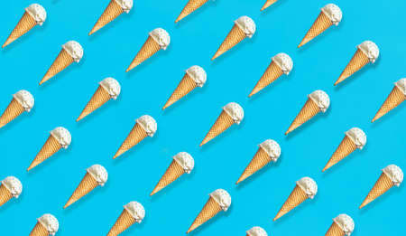 ice cream in waffle cones on blue backgroundの写真素材
