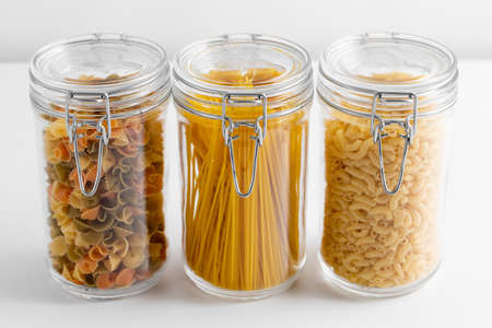 close up of jars with different pasta types