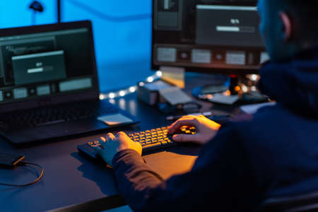hacker using computer virus for cyber attackの写真素材