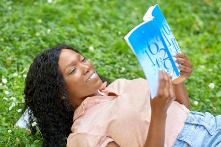 african student girl reading math textbookの写真素材