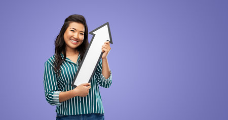 happy smiling woman with arrow pointing up