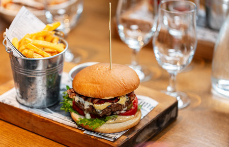 close up of french fries, ketchup and burgerの写真素材