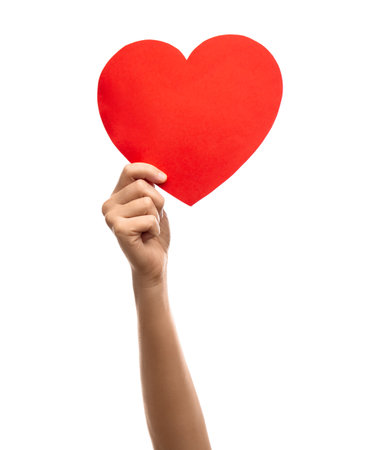 close up of hand holding red paper heartの写真素材