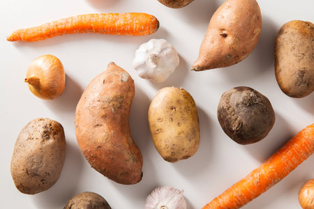 close up of different raw vegetables on tableの写真素材