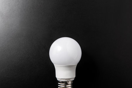 close up of lightbulb on black backgroundの写真素材