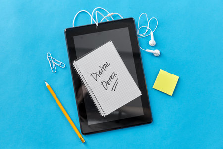 gadgets and digital detox words written in notepadの写真素材