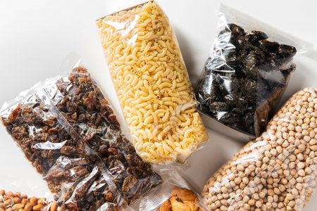 close up of dried fruits, cereals, pasta and nutsの写真素材
