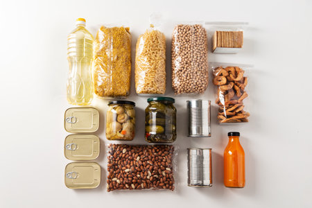 close up of different food and preserves on tableの写真素材