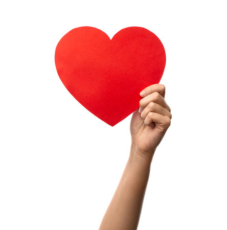 close up of hand holding red paper heartの写真素材