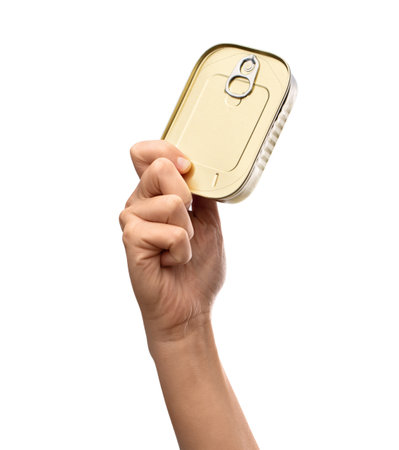 hand holding tin can with preserved foodの写真素材