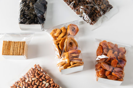 close up of dried fruits, nuts and cookiesの写真素材
