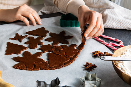 close up of hands working with gingerbread doughの写真素材
