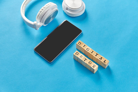 smartphone, headphones and digital detox words