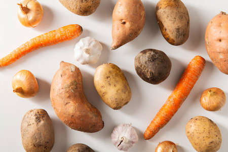 close up of different raw vegetables on tableの写真素材