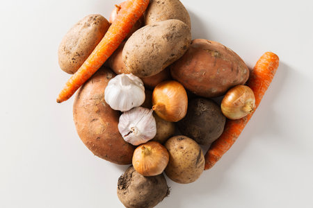 close up of different raw vegetables on tableの写真素材