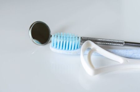 Dental tools toothbrush and tongue cleaner. Oral hygiene health conceptの写真素材