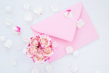 Framework of pink roses and gifts. Spring concept, flat lay, copy spaceの写真素材