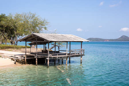 Over water bungalows with steps into amazing blue lagoonの写真素材