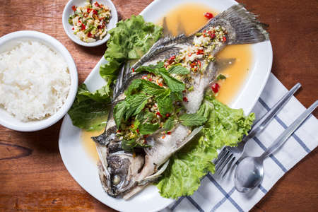 Steamed fish with lemon and riceの写真素材