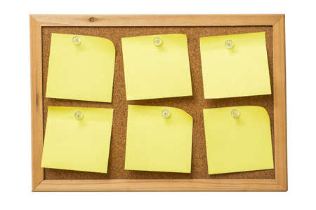 yellow sticky notes on cork  boardの写真素材