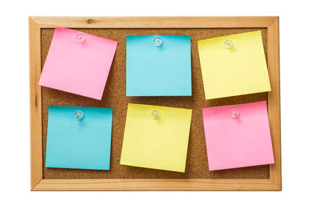 colorful sticky notes on cork bulletin boardの写真素材