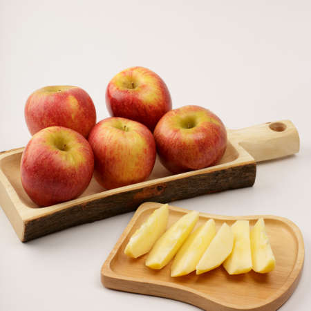 Red Organic Envy Apples Ready to Eat on white backgroundの写真素材