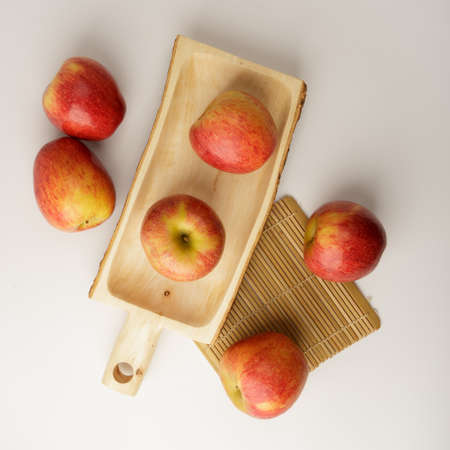 Red Organic Envy Apples Ready to Eat on white backgroundの写真素材