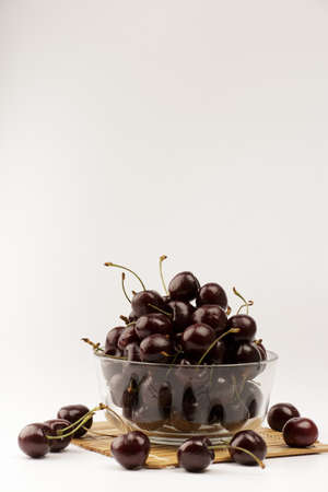 Red cherry. Fresh cherries. Cherry on white background. healthy food conceptの写真素材